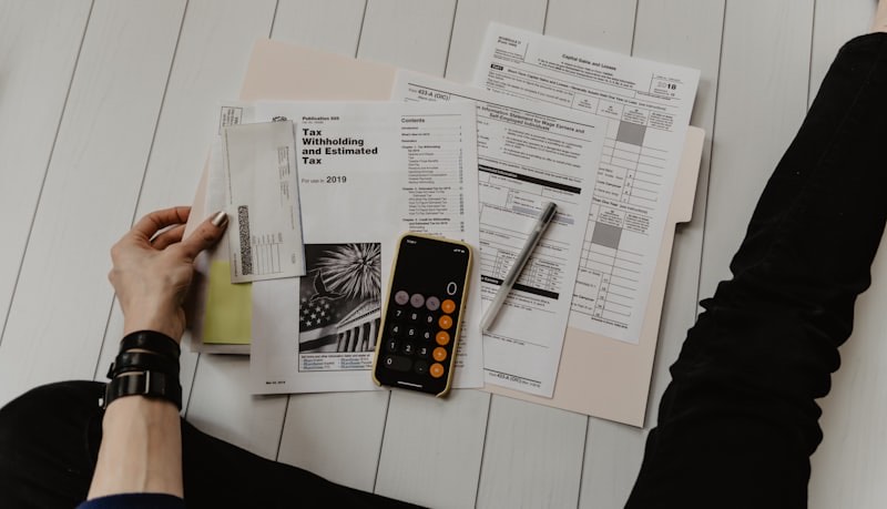 Calculator and paperwork for fee planning
